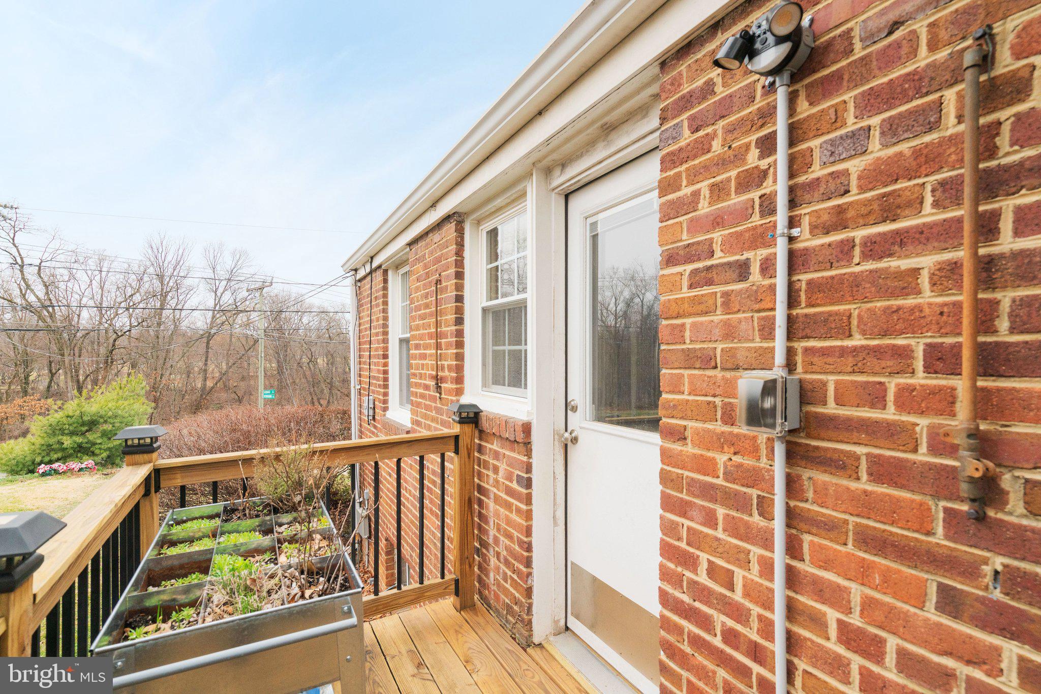1901 Scroggins Road Alexandria, VA 22302 - Photo 32 of 38 Charming brick entry with serene views.