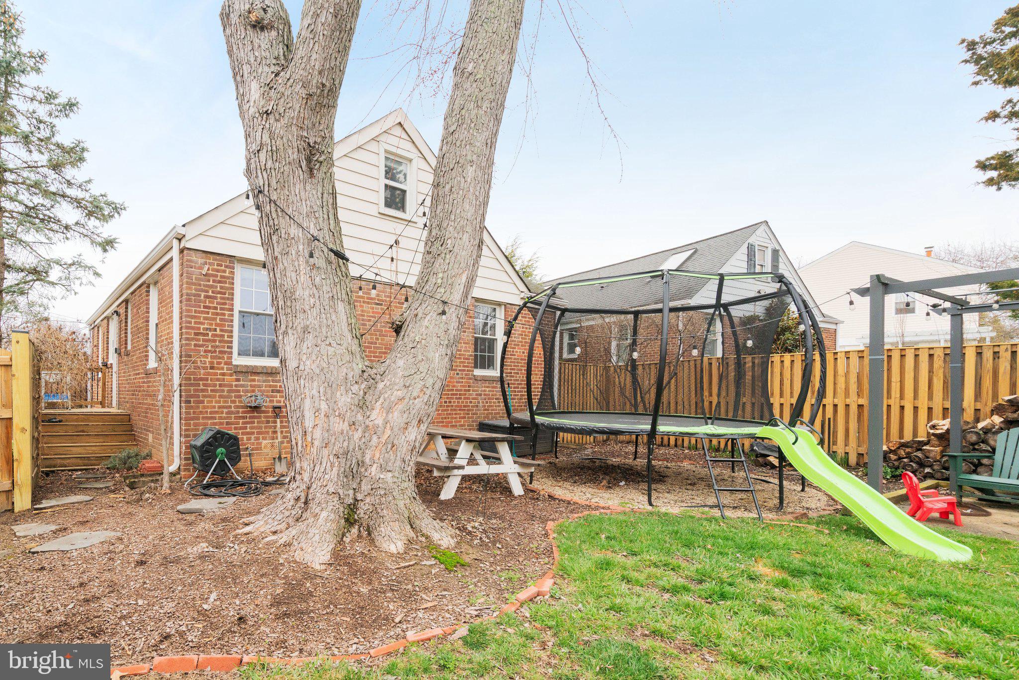 1901 Scroggins Road Alexandria, VA 22302 - Photo 34 of 38 Charming backyard retreat with playset.