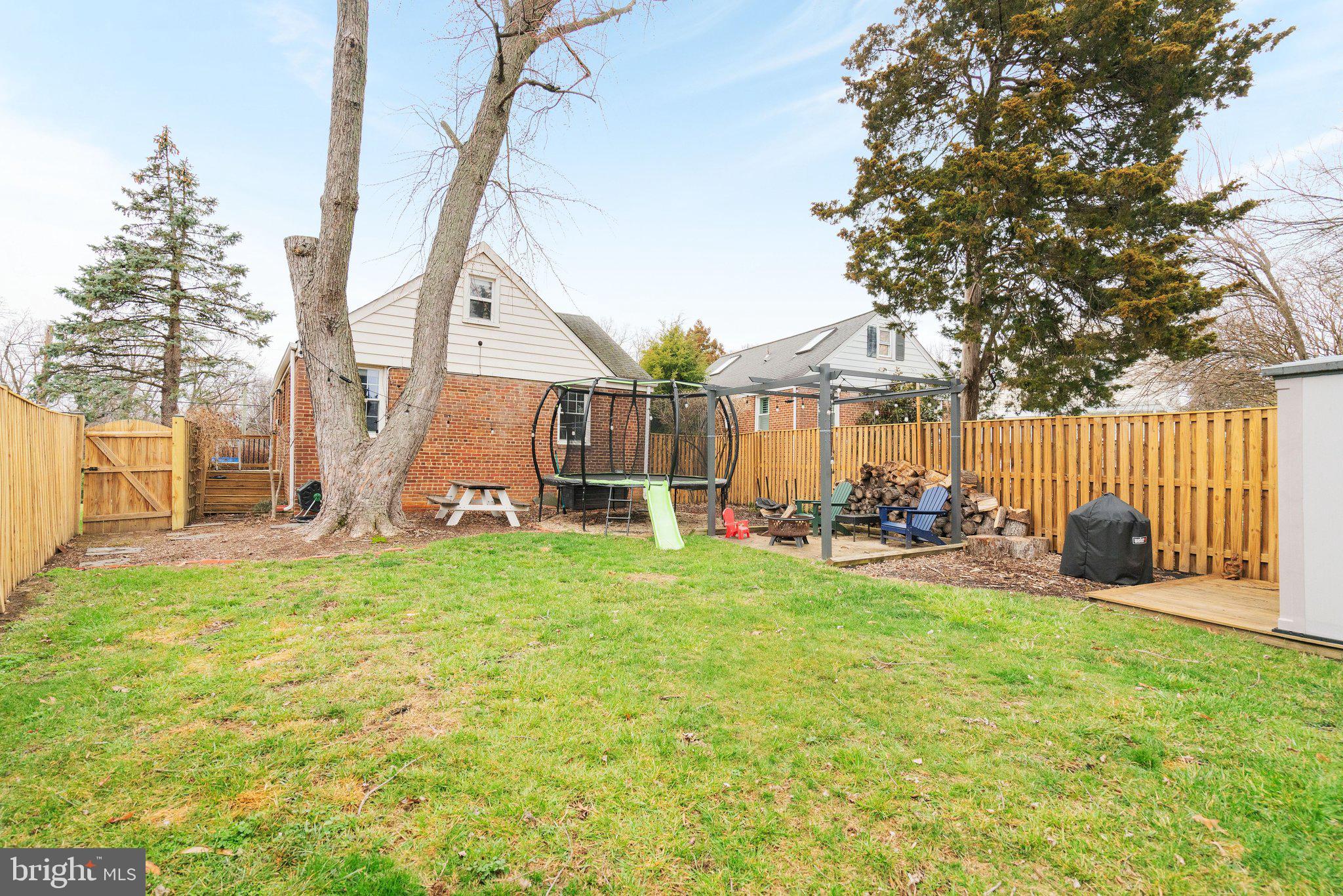 1901 Scroggins Road Alexandria, VA 22302 - Photo 35 of 38 Spacious backyard oasis for relaxation.