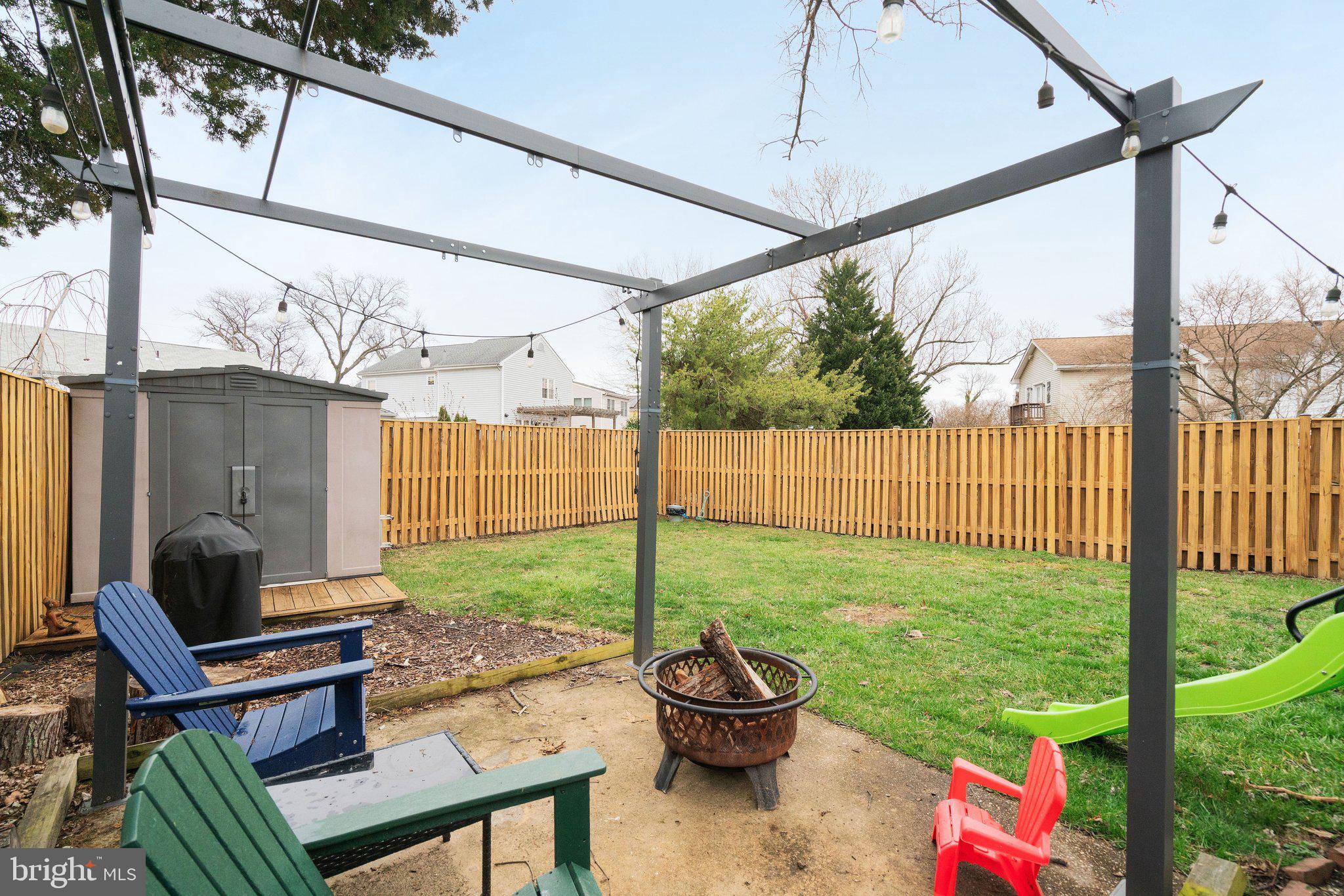 1901 Scroggins Road Alexandria, VA 22302 - Photo 36 of 38 Charming backyard retreat with fire pit.