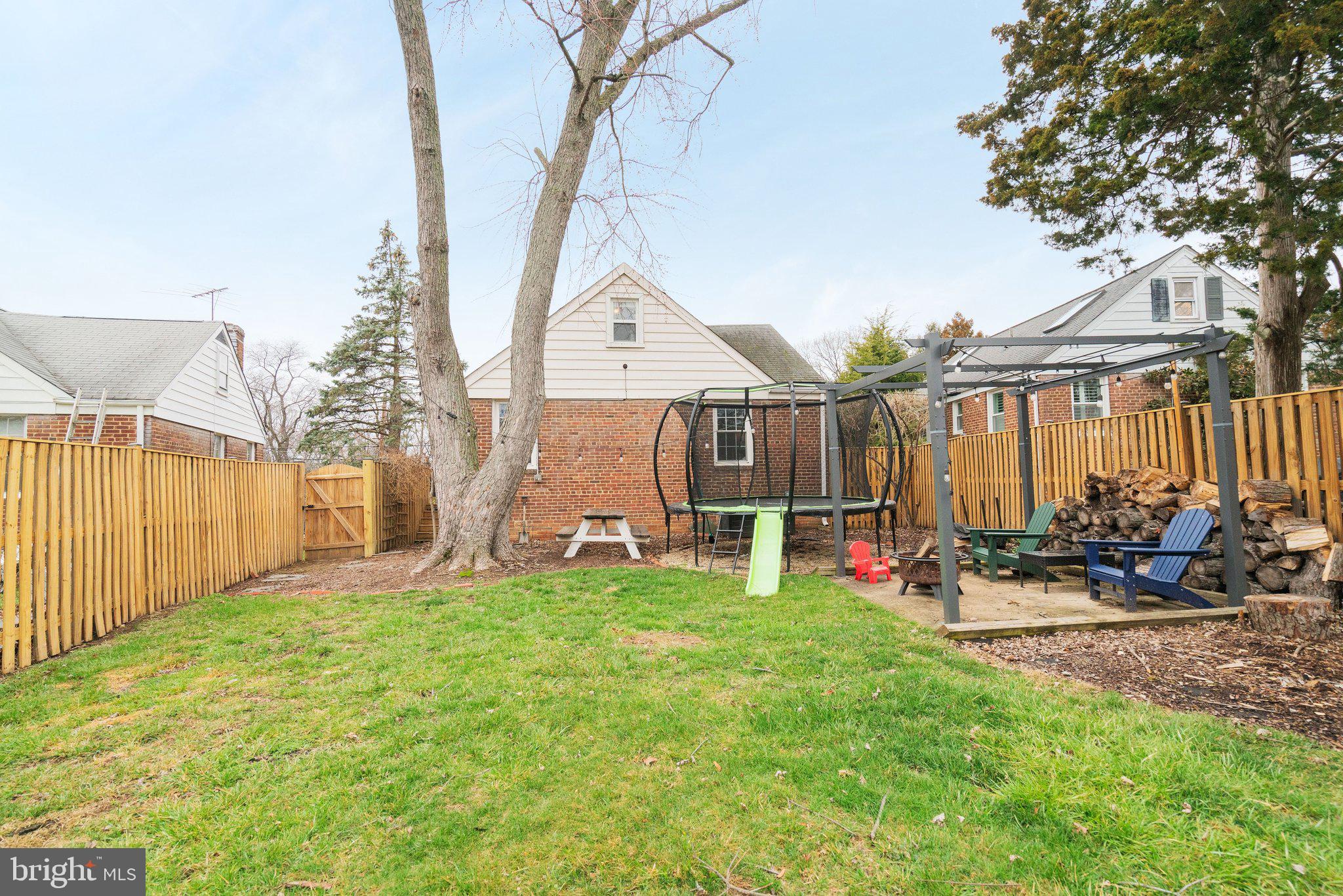 1901 Scroggins Road Alexandria, VA 22302 - Photo 38 of 38 Charming backyard oasis with greenery.