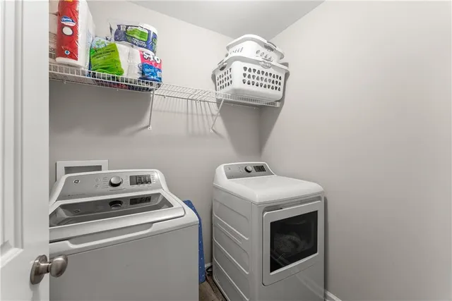 a utility room with dryer and washer