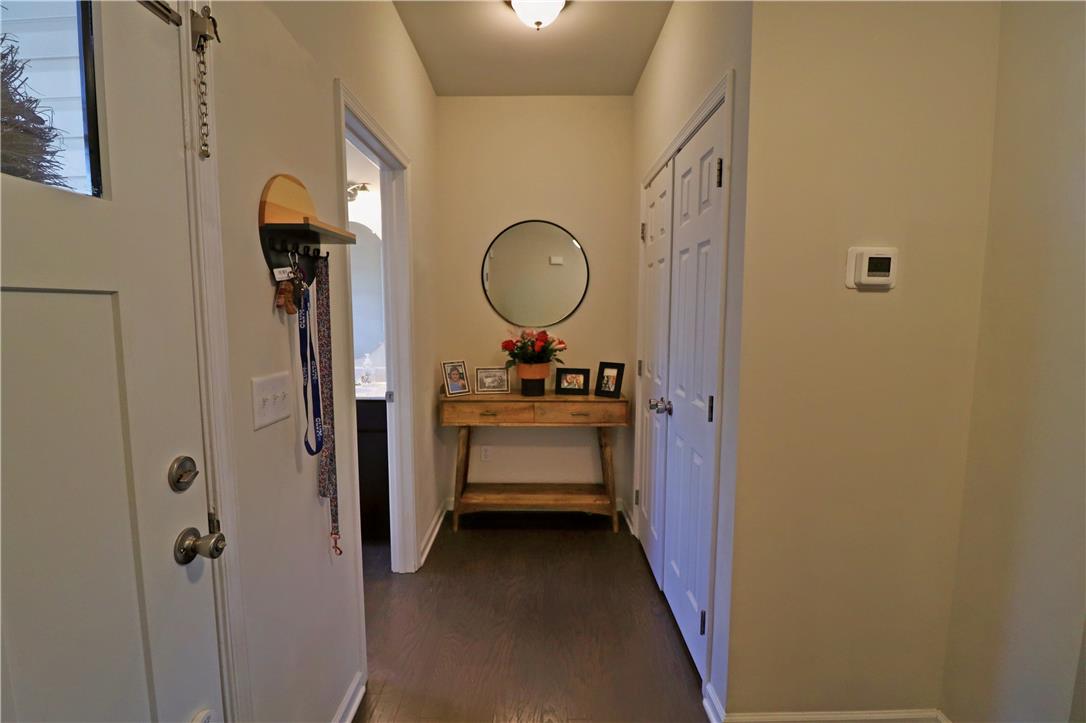 4502 Benjamin Court Emmaus, PA 18049 - Photo 5 of 53 A welcoming entry corridor features rich wood flooring and a convenient storage closet.