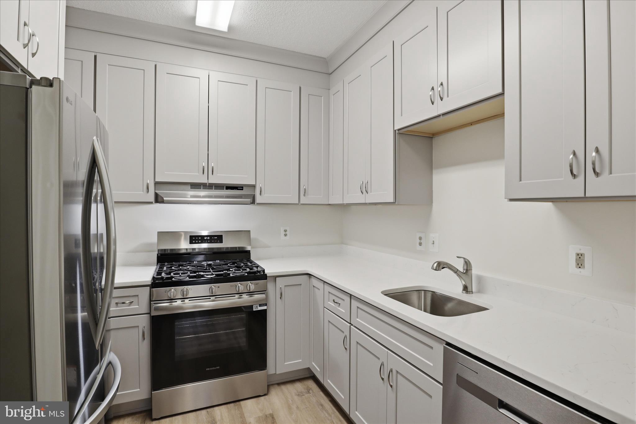 1704 Lake Shore Crest Drive, Unit 16 Reston, VA 20190 - Photo 2 of 39 NEW cabinets, appliances, counters