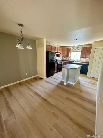 a bedroom with a bed and dresser