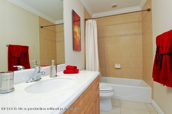121 Gregory Road West Palm Beach, FL 33405 - Photo 8 of 8 a bathroom with a sink toilet and shower
