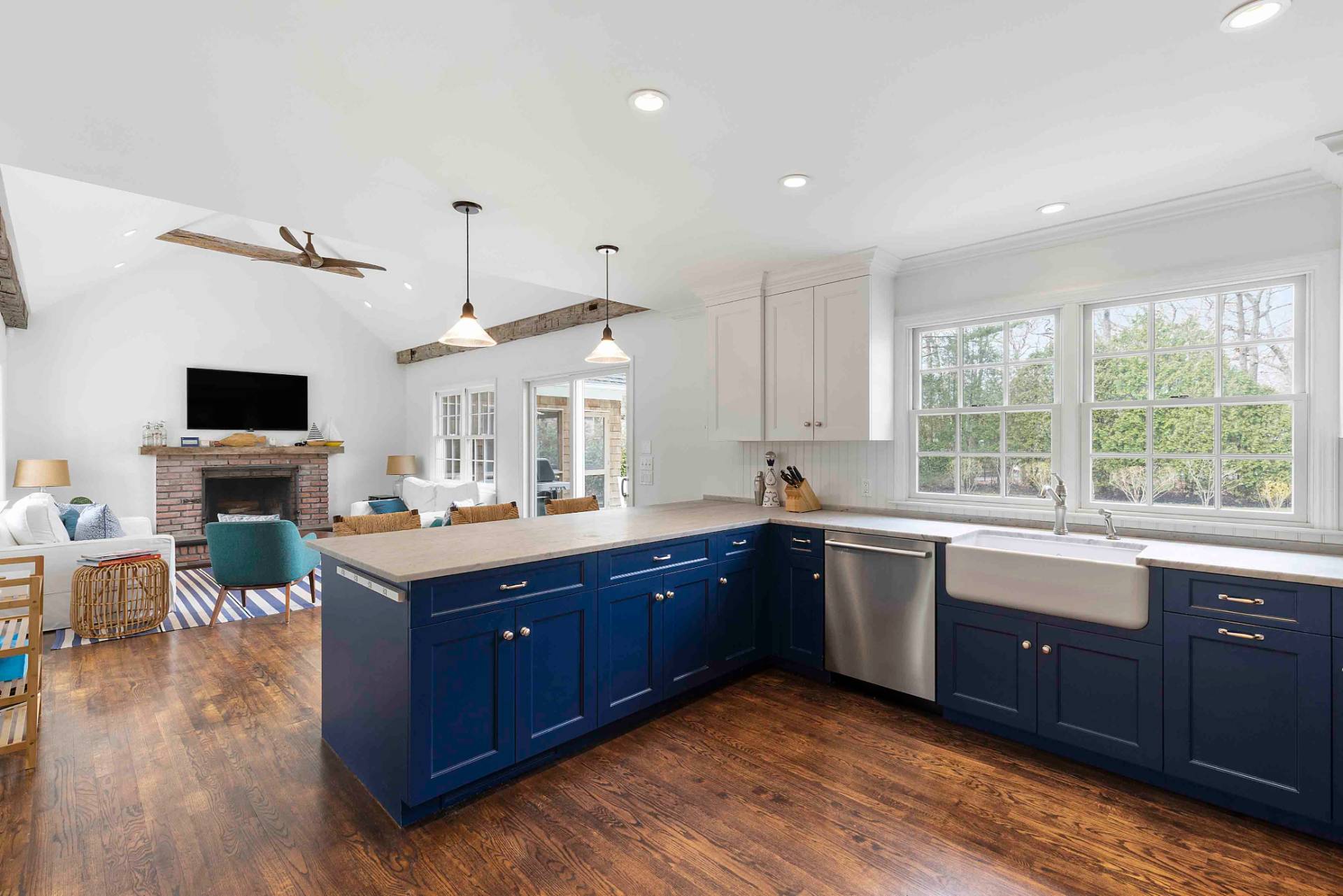 37 Foster Road Quogue, NY 11959 - Photo 2 of 11 a large kitchen with wooden floor and stainless steel appliances