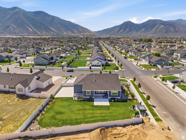 2786 West Hancock Street, Unit 198 Mapleton, UT 84664 - Photo 27 of 33 Contemporary residence featuring a dark gray exterior, white trim, and a spacious green lawn