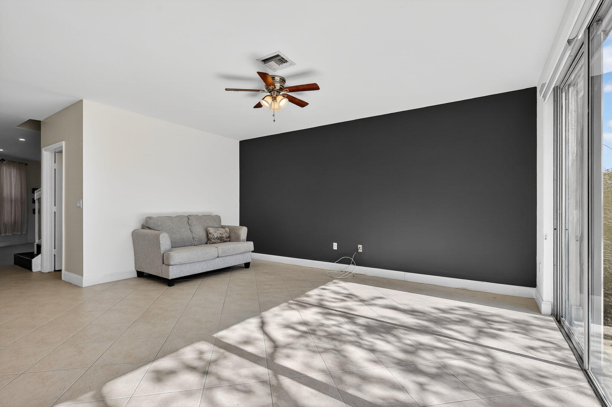 16286 Southwest 47th Manor Miramar, FL 33027 - Photo 17 of 61 a living room with furniture and a ceiling fan