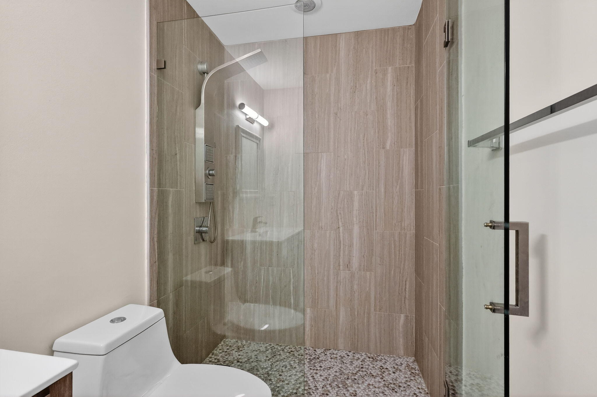 16286 Southwest 47th Manor Miramar, FL 33027 - Photo 36 of 61 a bathroom with a shower and toilet