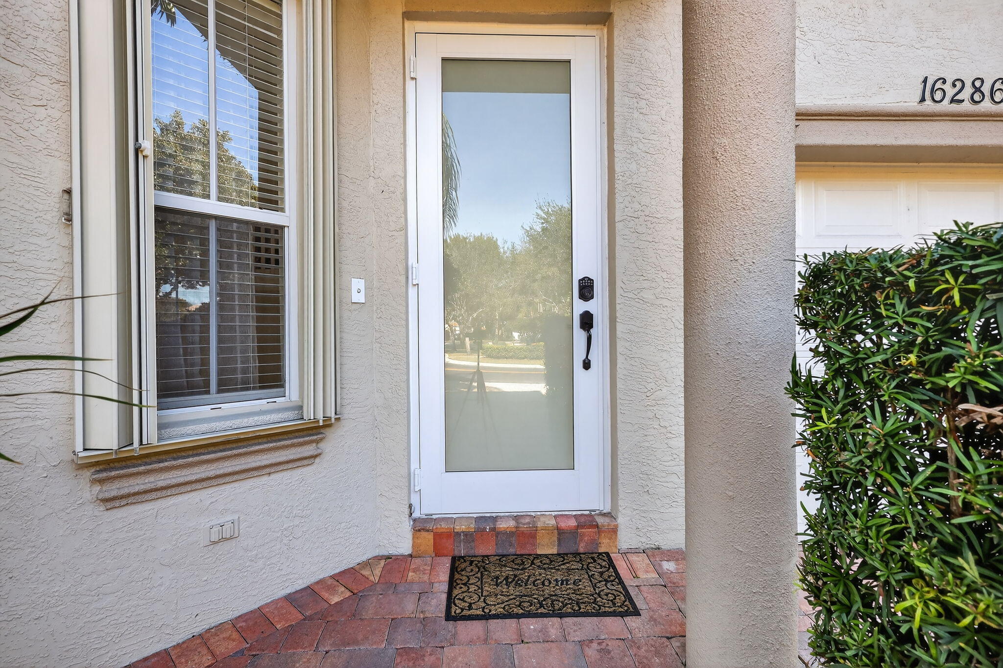 16286 Southwest 47th Manor Miramar, FL 33027 - Photo 4 of 61 a view of a door and a window