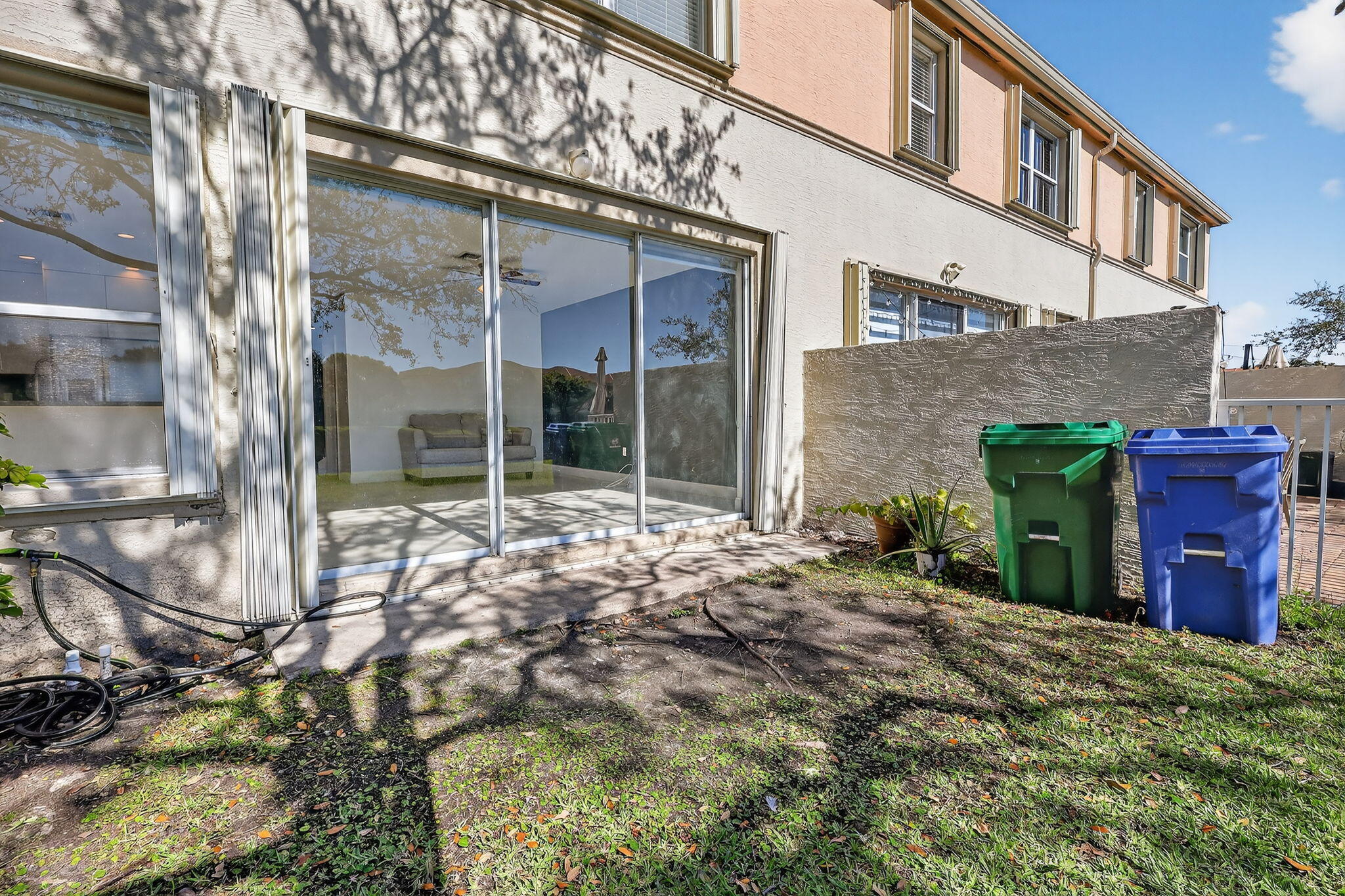 16286 Southwest 47th Manor Miramar, FL 33027 - Photo 43 of 61 a view of a house with a yard and pathway