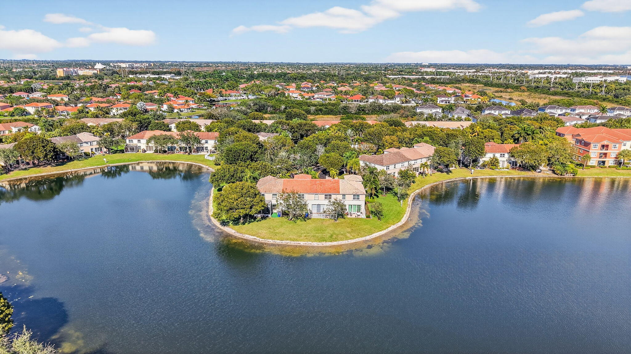 16286 Southwest 47th Manor Miramar, FL 33027 - Photo 59 of 61 an aerial view of a residential houses with outdoor space swimming pool and mountain view