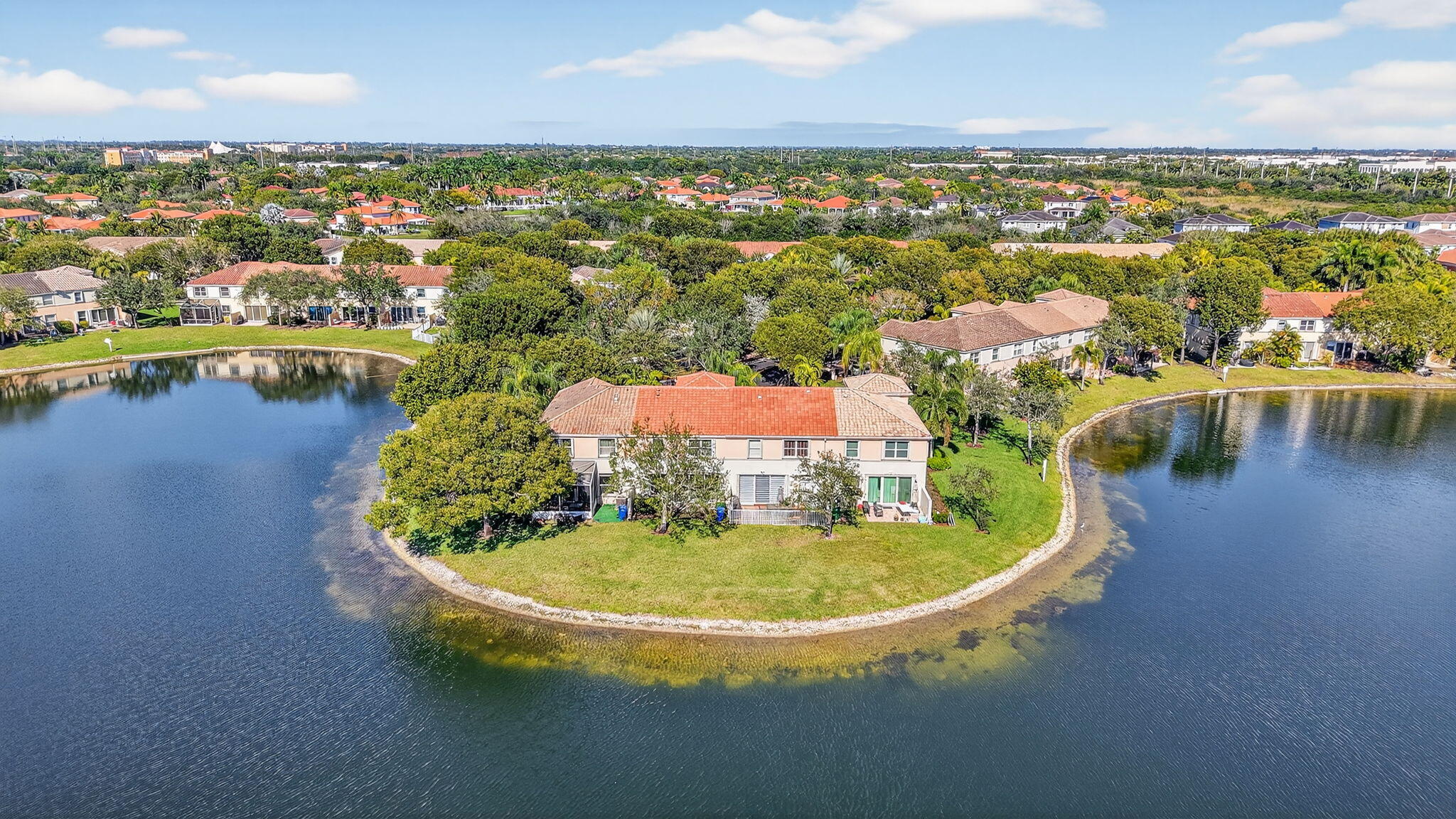 16286 Southwest 47th Manor Miramar, FL 33027 - Photo 60 of 61 an aerial view of residential houses with outdoor space