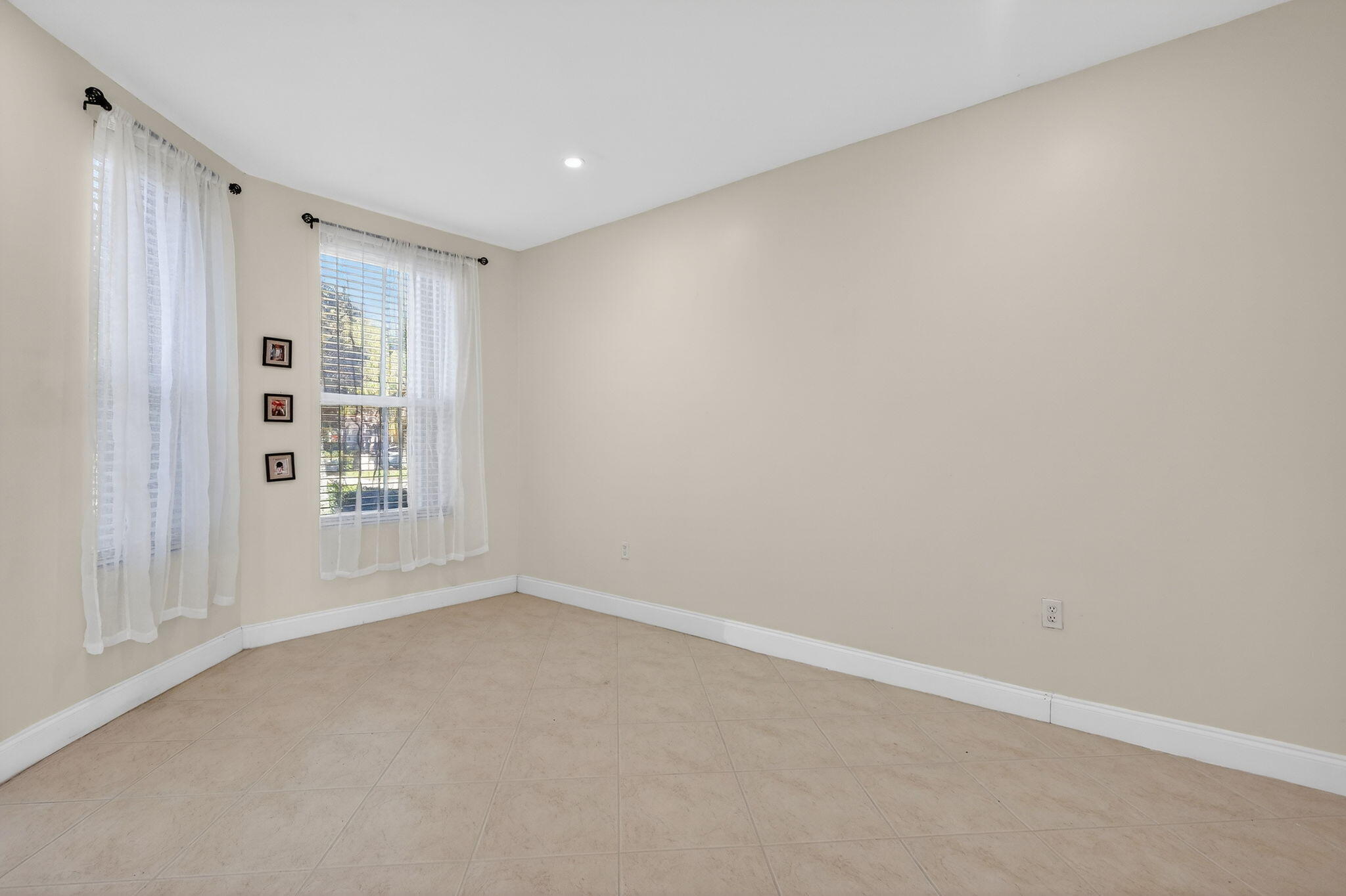 16286 Southwest 47th Manor Miramar, FL 33027 - Photo 6 of 61 a view of an empty room with a window