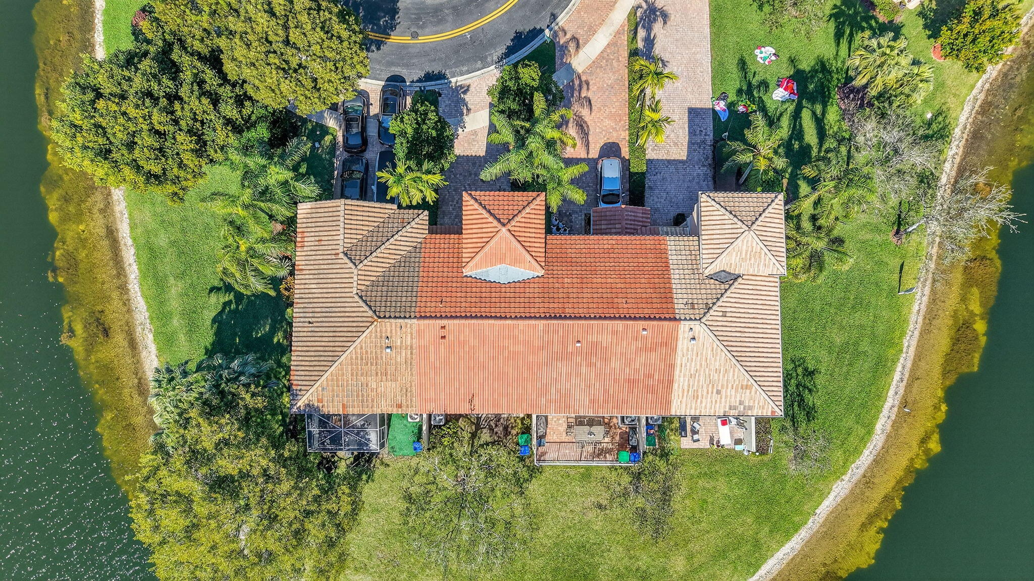 16286 Southwest 47th Manor Miramar, FL 33027 - Photo 61 of 61 an aerial view of a house with a yard potted plants and large tree