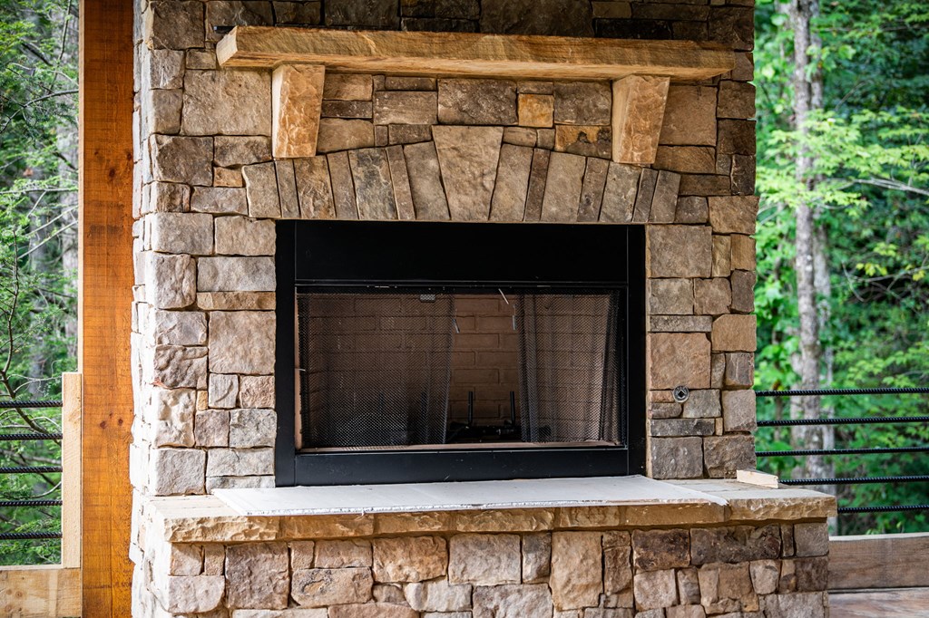1204 Settler's Ridge Road Ellijay, GA 30540 - Photo 13 of 62 a front view of a house with a garage