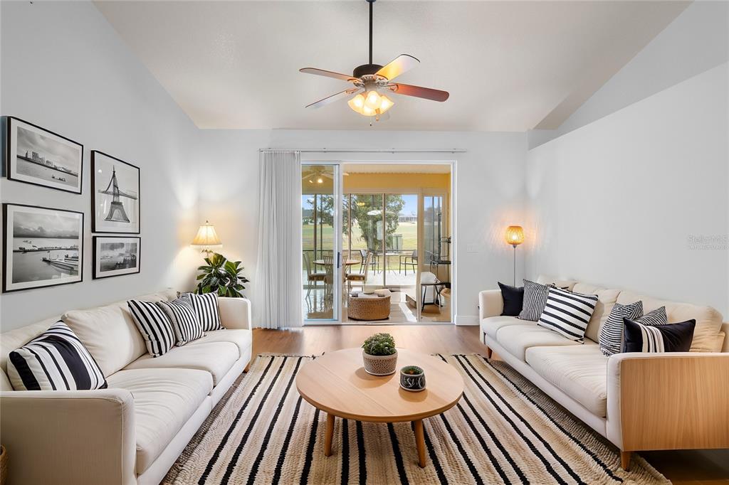 11767 Southeast 176th Place Road Summerfield, FL 34491 - Photo 6 of 37 LIVING ROOM - VIRTUALLY STAGED