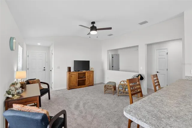 a kitchen with sink cabinets and microwave