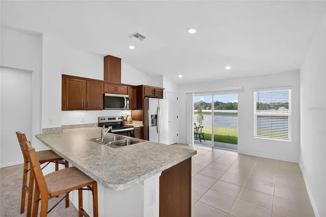 a view of a dining room with furniture