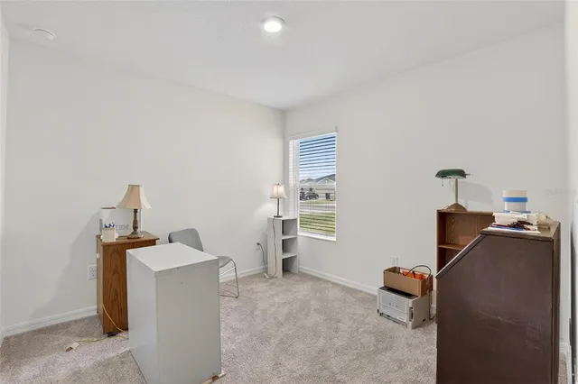 a view of an empty room with a sliding door