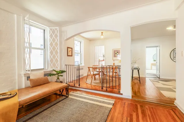 a view of a hallway with an entryway