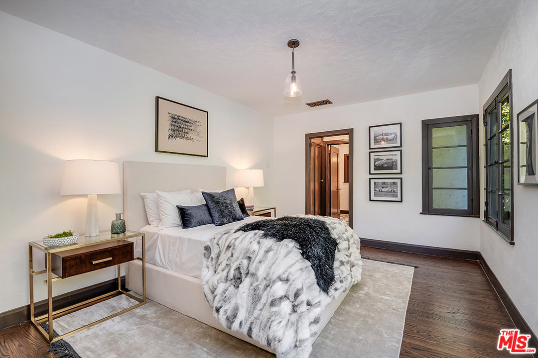 2426 Chislehurst Drive Los Angeles, CA 90027 - Photo 19 of 43 a bedroom with bed and window