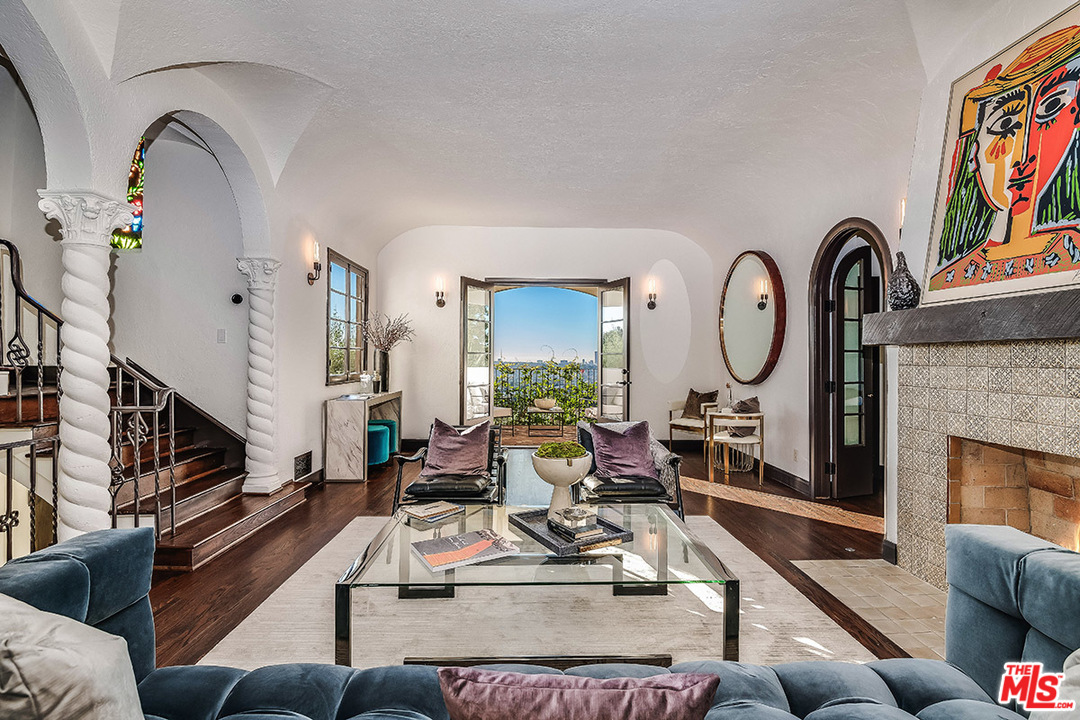 2426 Chislehurst Drive Los Angeles, CA 90027 - Photo 3 of 43 a living room with fireplace furniture and a fireplace