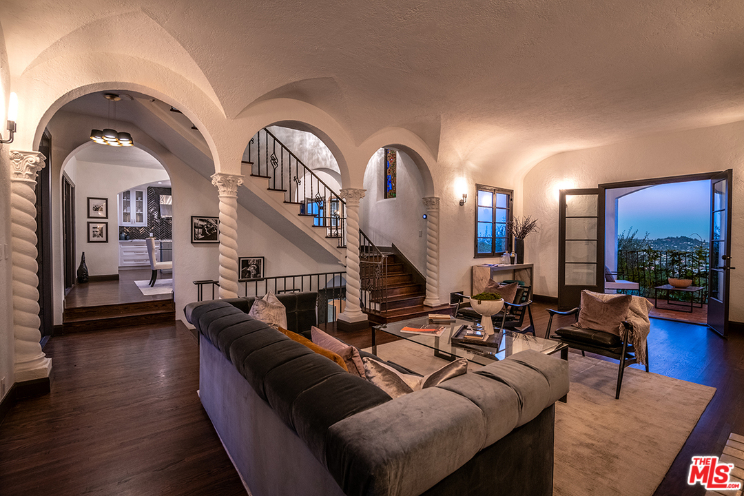 2426 Chislehurst Drive Los Angeles, CA 90027 - Photo 30 of 43 a living room with patio furniture and wooden floor