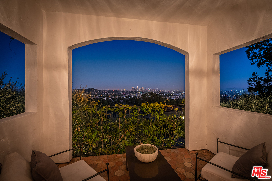 2426 Chislehurst Drive Los Angeles, CA 90027 - Photo 32 of 43 a view of balcony furniture and a potted plant