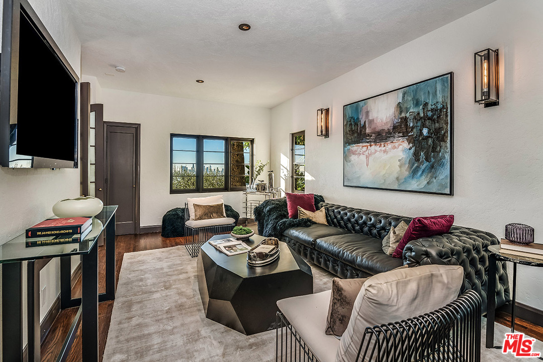 2426 Chislehurst Drive Los Angeles, CA 90027 - Photo 10 of 43 a living room with furniture and a flat screen tv