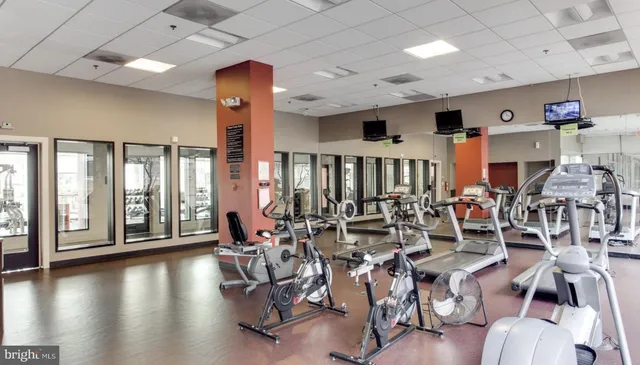 a very nice looking living room with furniture and wooden floor