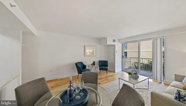 a living room with furniture and window