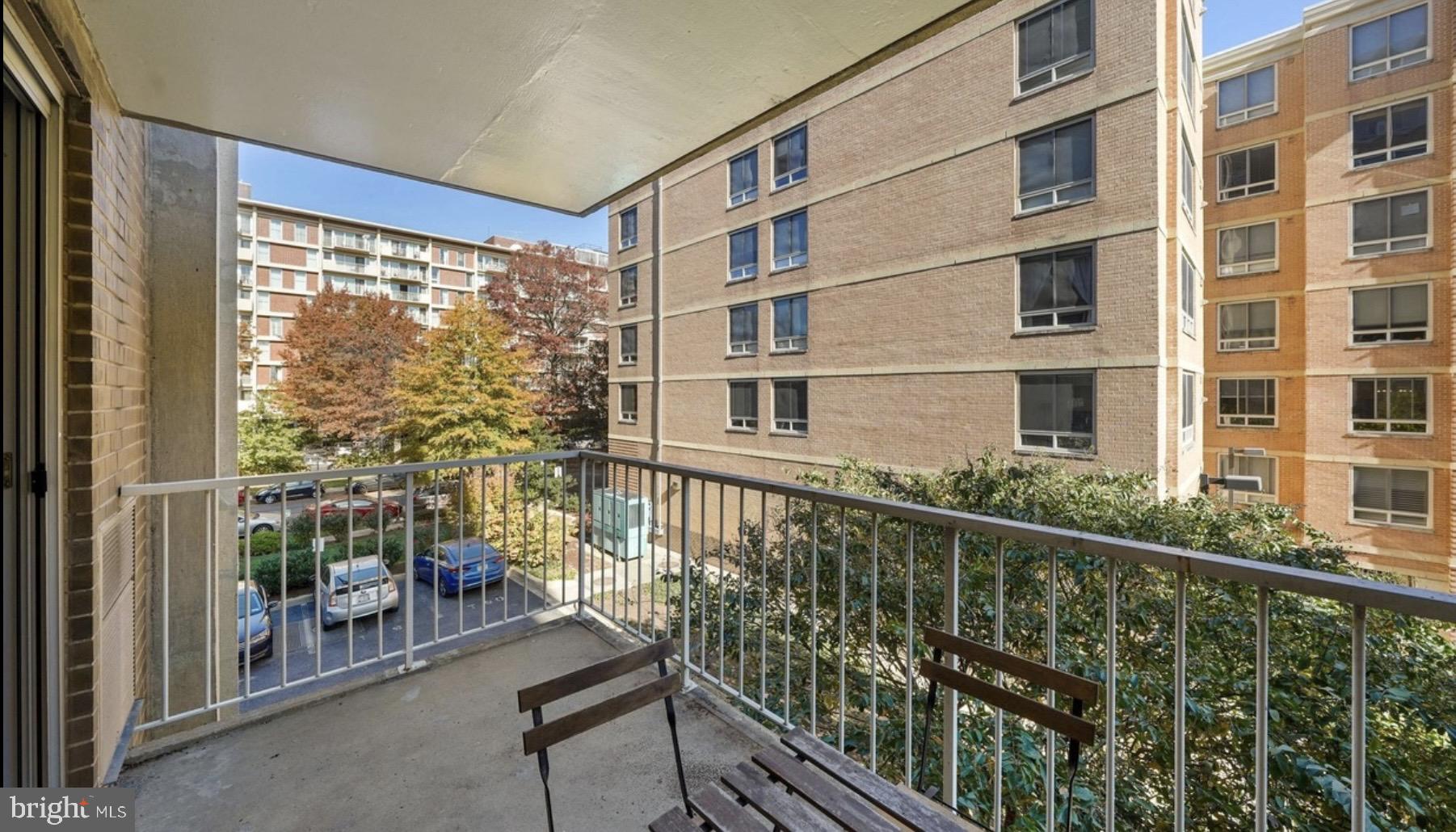 800 4th Street Southwest, Unit N120 Washington, DC 20024 - Photo 10 of 30 a view of a balcony with chairs