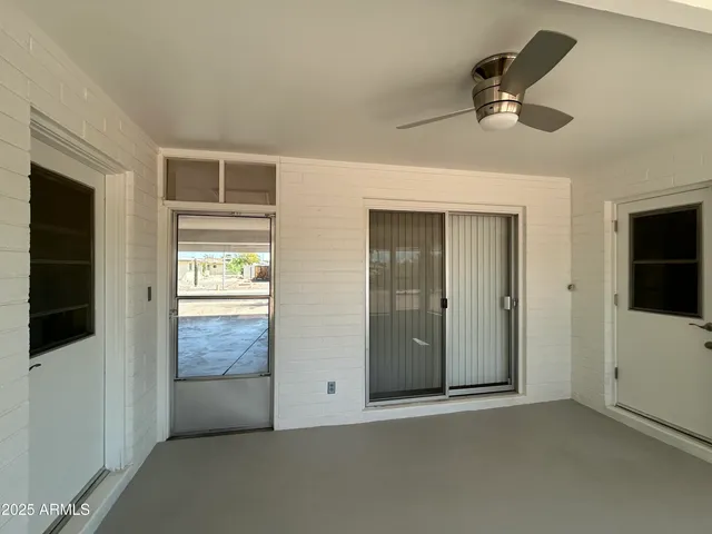 wooden floor and window in an empty room