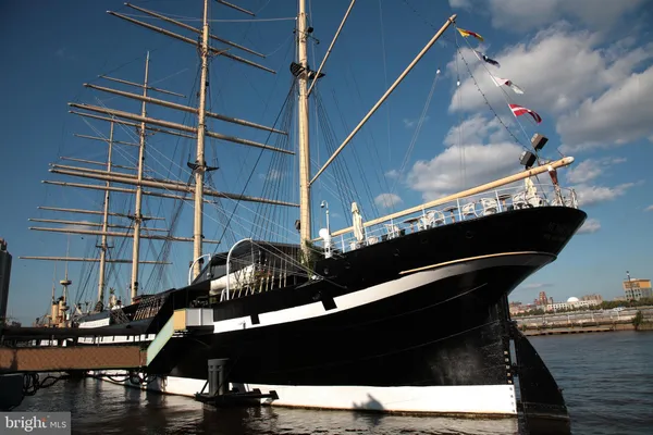 a room with furniture and wooden floor