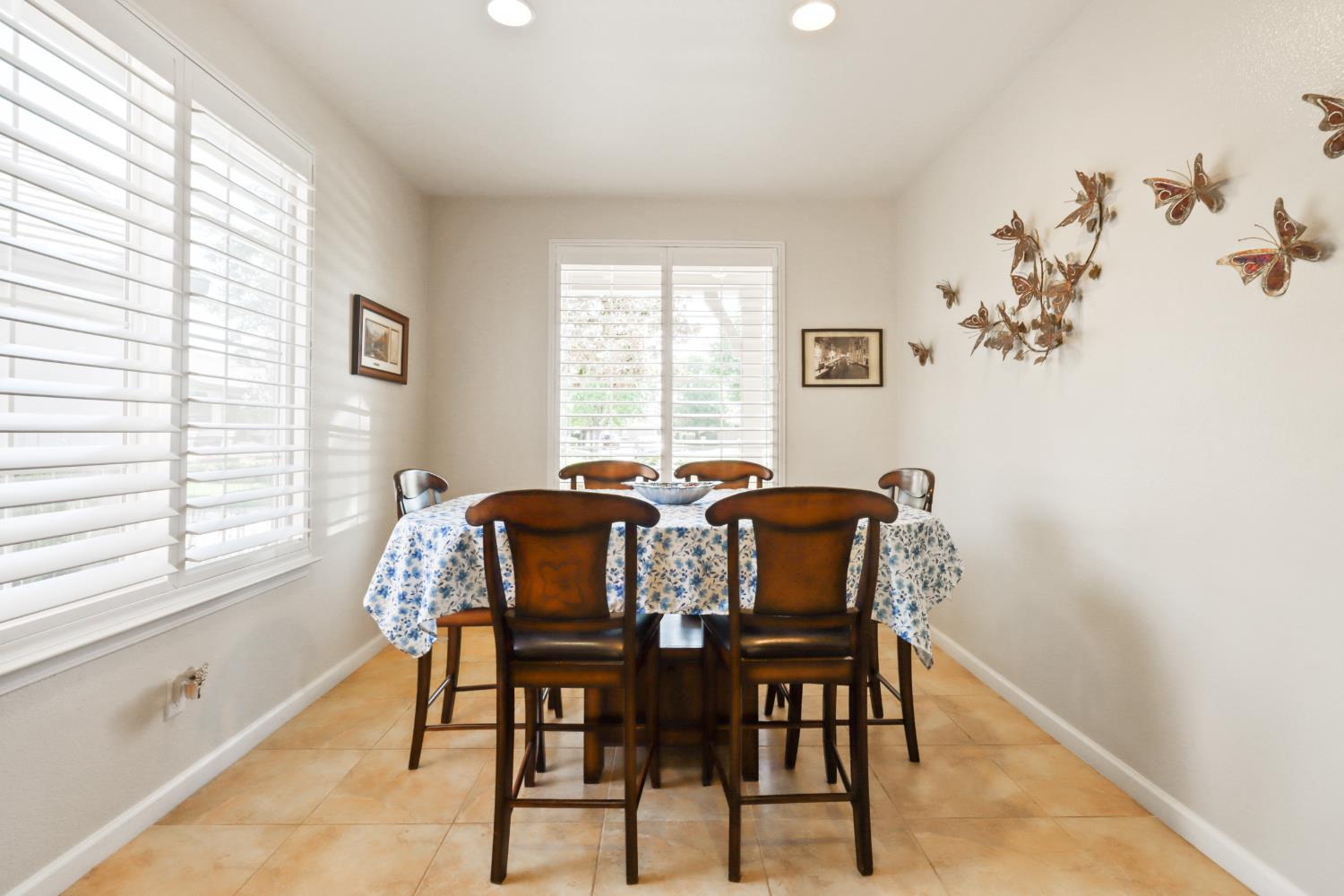 7401 Rothschild Court Elk Grove, CA 95757 - Photo 13 of 42 a view of a dining room with furniture and a window