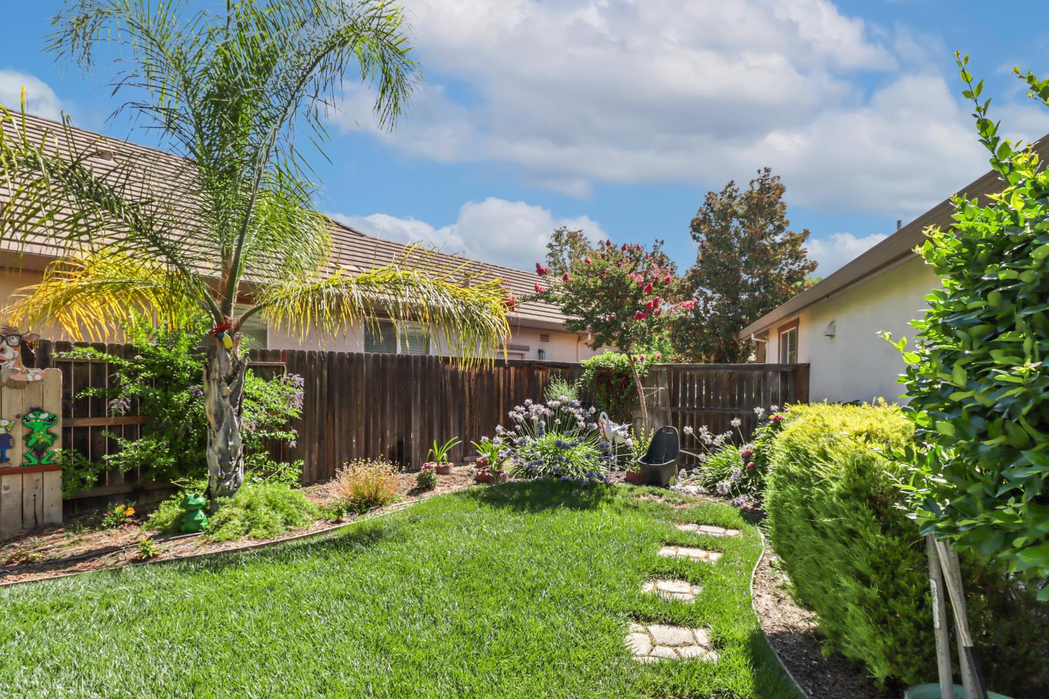 7401 Rothschild Court Elk Grove, CA 95757 - Photo 34 of 42 a view of a chair and table in the garden