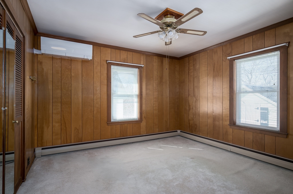 2 Worcester Street Clinton, MA 01510 - Photo 12 of 26 an empty room with windows and fan