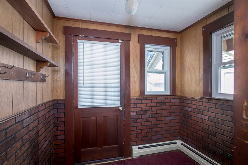 2 Worcester Street Clinton, MA 01510 - Photo 15 of 26 a view of a brick house with wooden floor