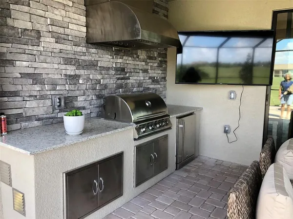 a kitchen with a stove and a microwave