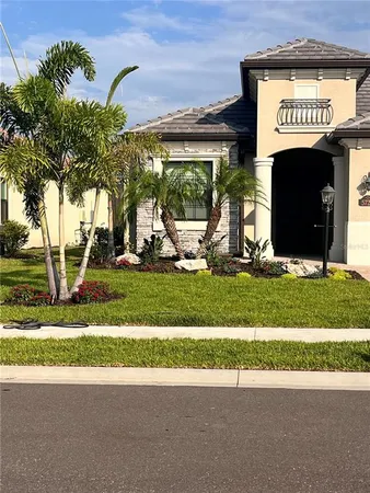 a view of a sign board with a big yard