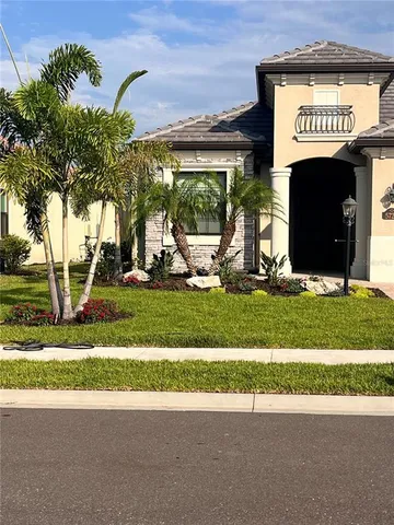 a view of a sign board with a big yard