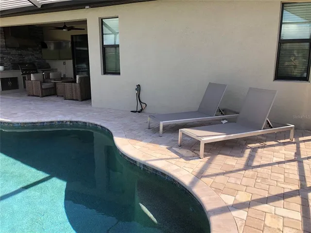 a bathroom with sink and mirror