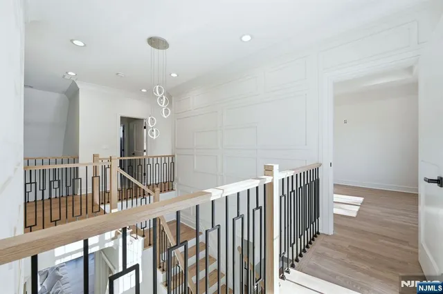 a bedroom with a bed and ceiling fan