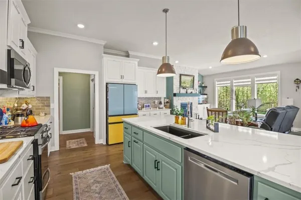 $550,000 | 1713 Northeast Ravenwood Drive, Lee's Summit, MO 64086