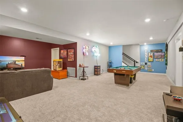 $550,000 | 1713 Northeast Ravenwood Drive, Lee's Summit, MO 64086