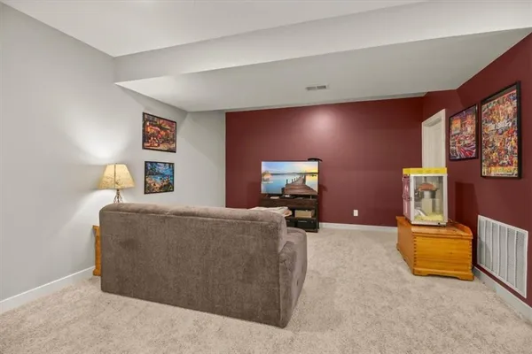 $550,000 | 1713 Northeast Ravenwood Drive, Lee's Summit, MO 64086