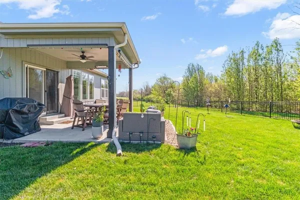 $550,000 | 1713 Northeast Ravenwood Drive, Lee's Summit, MO 64086