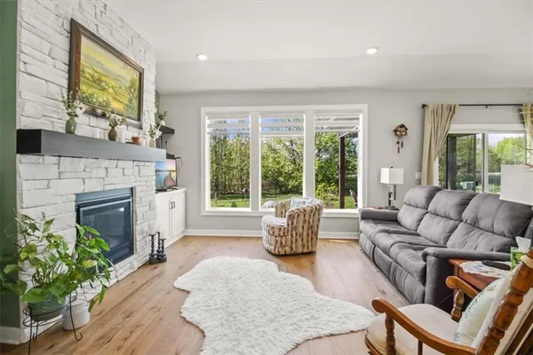 $550,000 | 1713 Northeast Ravenwood Drive, Lee's Summit, MO 64086